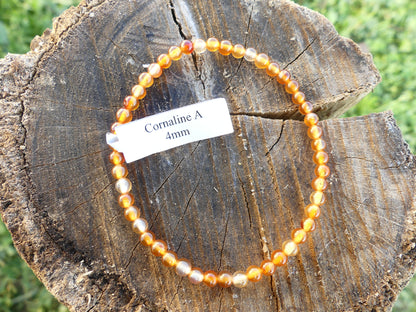 Bracelet boule diamètre 04mm en Cornaline sur fil élastiqué.
