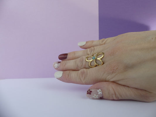 Bague fleur ajourée ajustable – Douceur fleurie