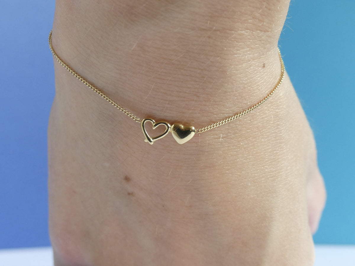 Bracelet femme fine maille gourmette deux cœurs – acier inoxydable doré
