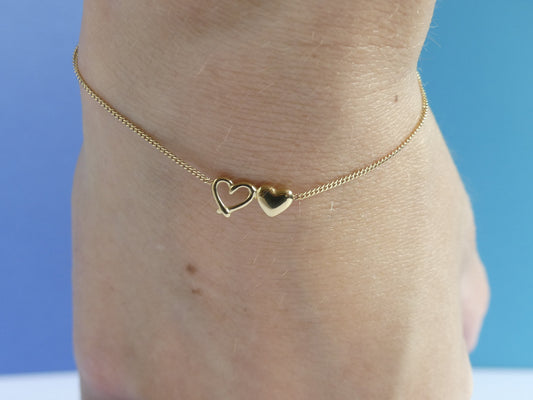 Bracelet femme fine maille gourmette deux cœurs – acier inoxydable doré
