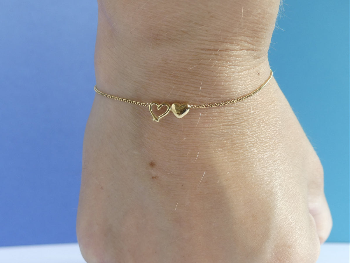 Bracelet femme fine maille gourmette deux cœurs – acier inoxydable doré
