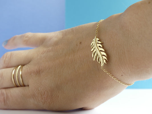 Bracelet femme plume gravée – acier inoxydable doré 
