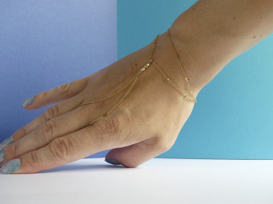 Chaîne de main femme deux rangs cristaux – acier inoxydable doré