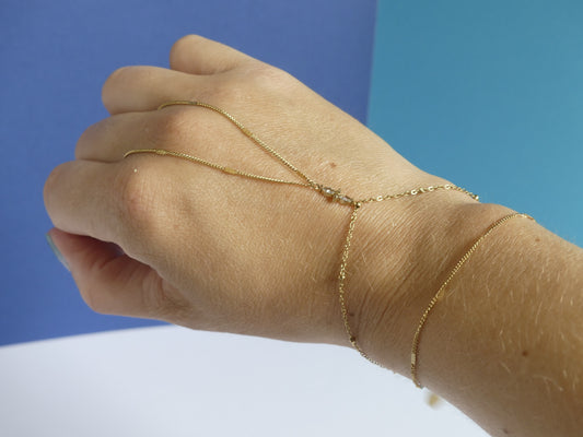 Chaîne de main femme deux rangs cristaux – acier inoxydable doré