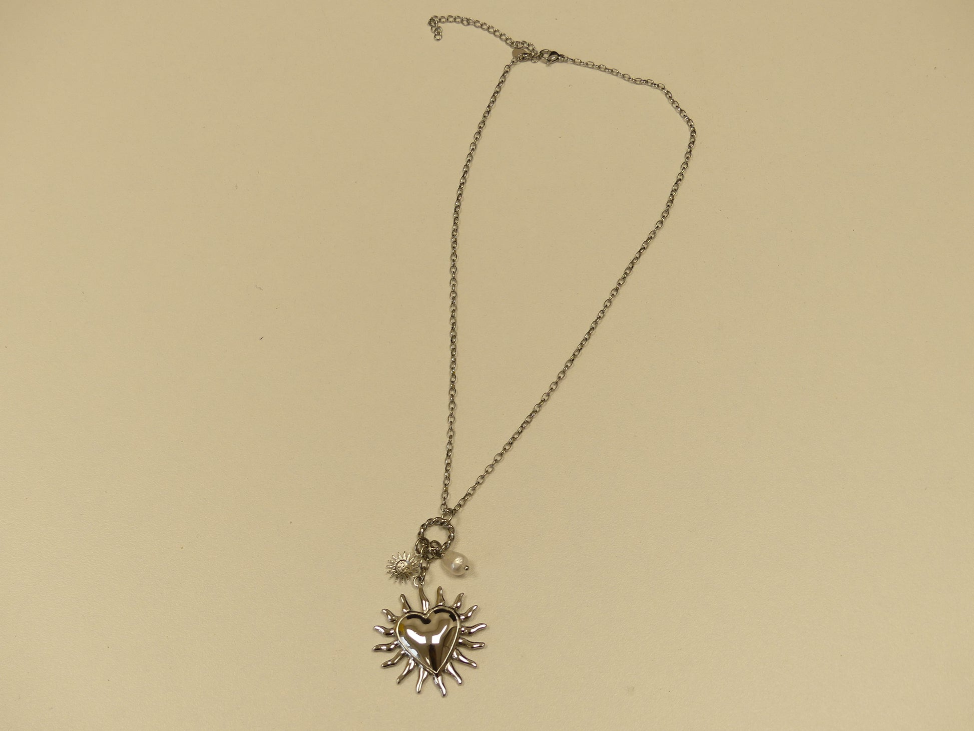 Collier - coeur, soleil et perle d'eau douce