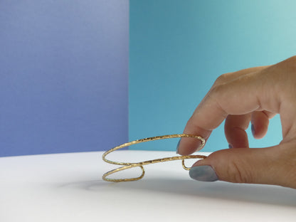 Manchette femme deux rangs diamantés – acier inoxydable doré