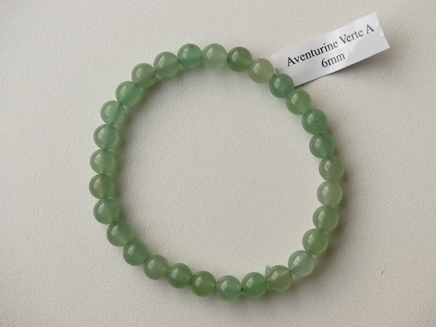 Bracelet boule de diamètre 06mm en Aventurine Verte sur fil élastiqué. Pierre naturelle de qualité A.