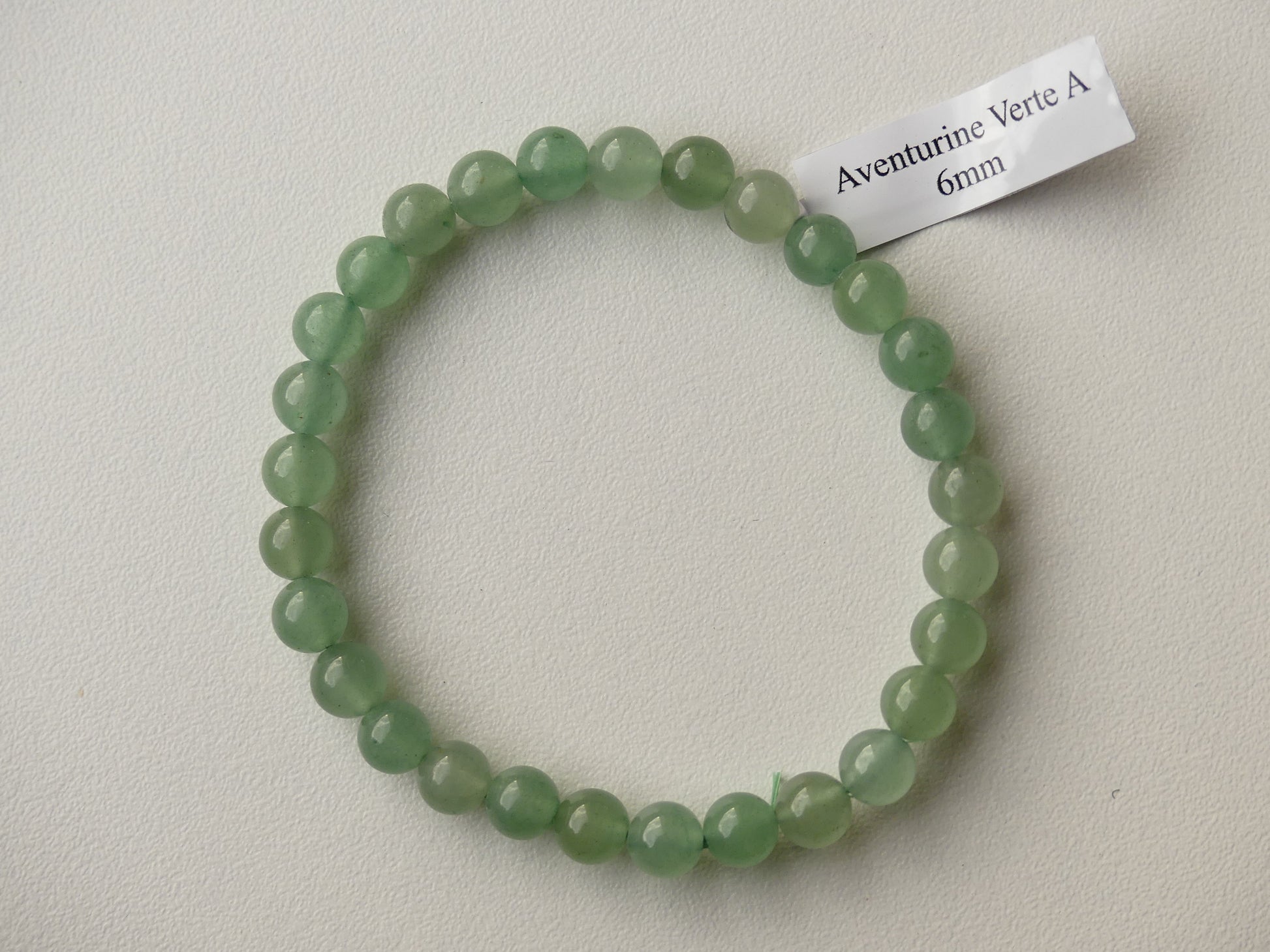 Bracelet boule de diamètre 06mm en Aventurine Verte sur fil élastiqué. Pierre naturelle de qualité A.