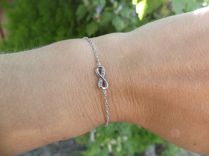 bracelet pendentif infini argenté