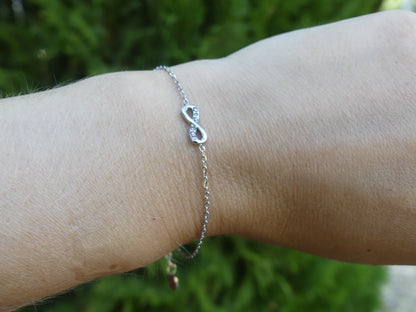 bracelet pendentif infini argenté