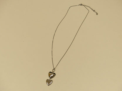 Collier - pendentif double coeur