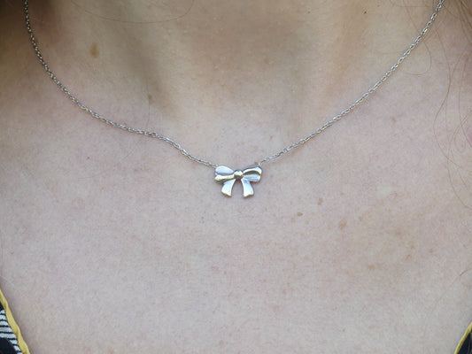 collier petit noeud papillon argenté